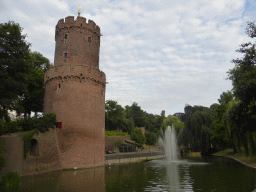 The Kruittoren tower and the pool with fountain at the Kronenburgerpark