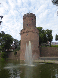 The Kruittoren tower and the pool with fountain at the Kronenburgerpark