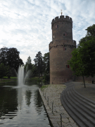 The Kruittoren tower and the pool with fountain at the Kronenburgerpark