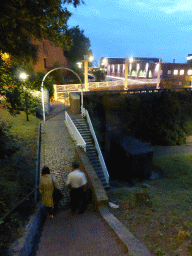 Miaomiao and her father at the staircase at the west side of the Valkhof park, at sunset