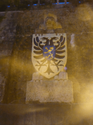 The coat of arms of Nijmegen at the Veerpoorttrappen staircase, at sunset