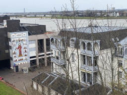 The Waal river with the Nijmegen railway bridge and the `Prinses uit het Oosten` wall painting, viewed from the Valkhof park