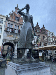 The Mariken van Nieumeghen statue in front of the Kerkboog arch at the Grote Markt square