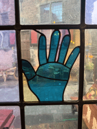 Stained glass window at the entrance to the Café In de Blaauwe Hand