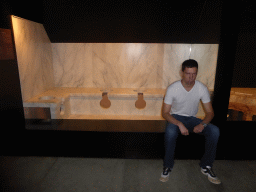 Tim on a Roman toilet, at the ground floor of the Museum of the Pont du Gard aqueduct bridge