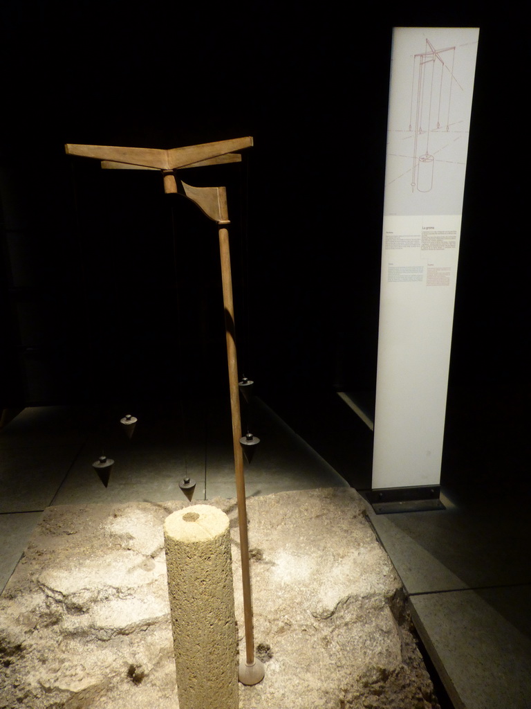 Pole with weights, at the ground floor of the Museum of the Pont du Gard aqueduct bridge