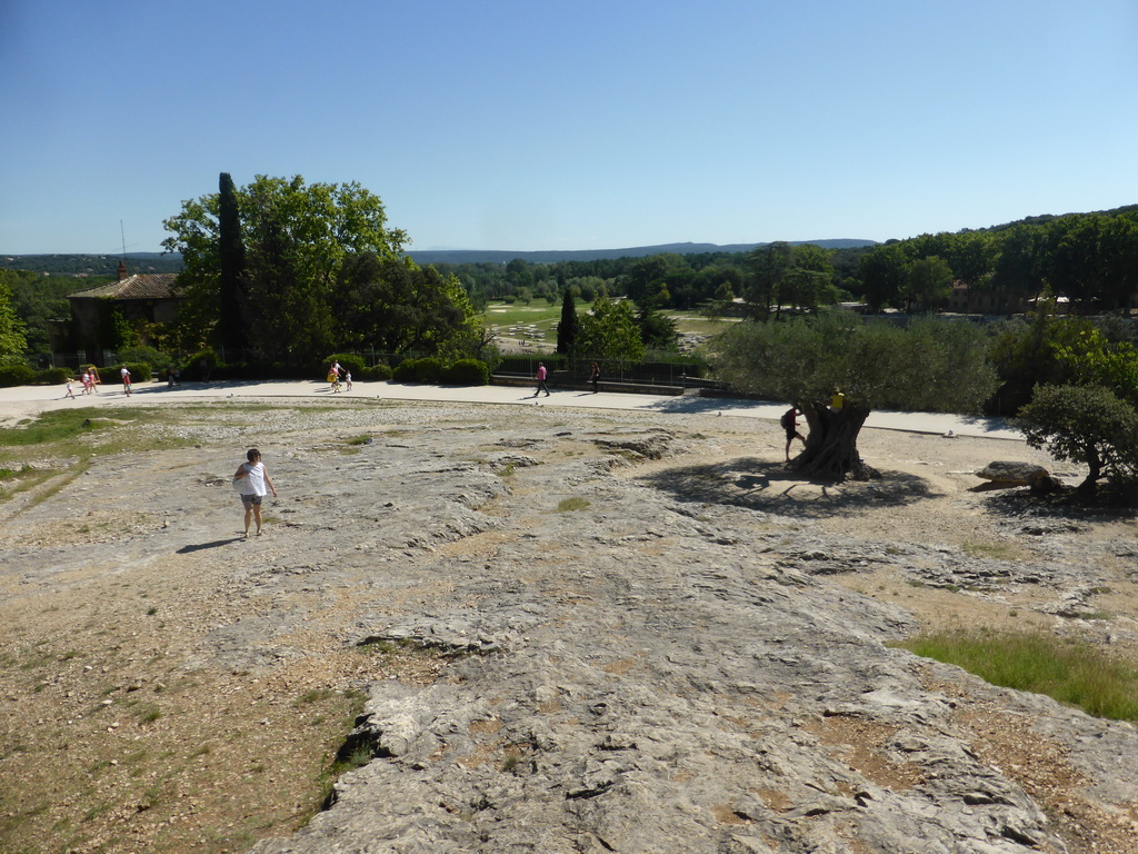 Miaomiao at the road on the northwest side of the Pont du Gard aqueduct bridge