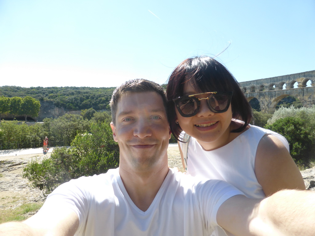 Tim and Miaomiao and the northwest side of the Pont du Gard aqueduct bridge