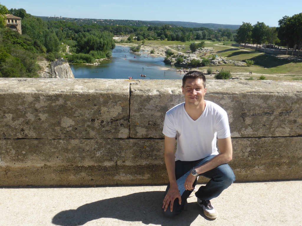 Tim at the Pont du Gard aqueduct bridge, with a view on the north side of the Gardon river