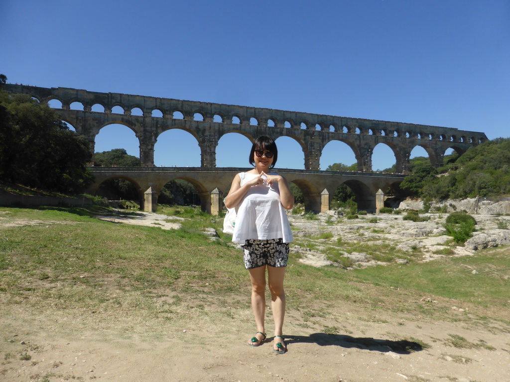 Miaomiao with the Pont du Gard aqueduct bridge and the grassland at the northeast side