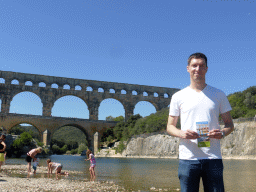 Tim at the north side of the Gardon river, with a view on the Pont du Gard aqueduct bridge