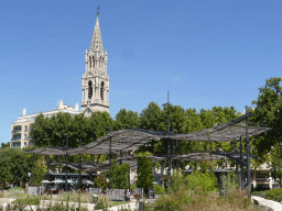 Bamboo roofs at the Esplanade Charles-de-Gaulle square and the Eglise Sainte Perpétue church