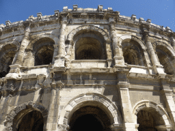 Southwest facade of the Arena of Nîmes at the Place des Arènes square