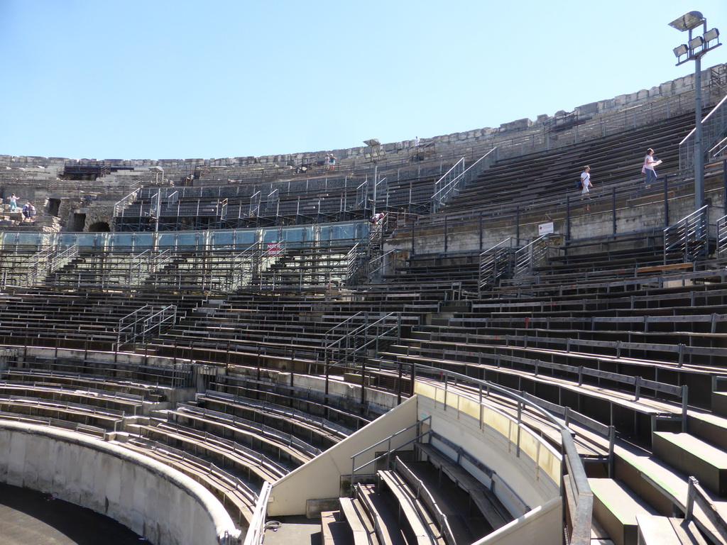 The lower middle rows of seats at the southwest side of the Arena of Nîmes
