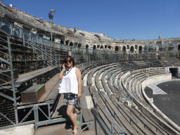 Miaomiao at the upper middle rows of seats at the north side of the Arena of Nîmes
