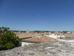 The north side of the city with the towers of the Nîmes Cathedral and the Eglise Saint Baudile church, viewed from the top rows of seats of the Arena of Nîmes