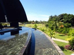 The beach and grassfield of the Inaya Putri Bali hotel, viewed from the right side of the lobby