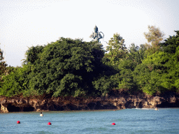 The Krishna & Arjuna statue at Peninsula Island and the Lombok Strait, viewed from the beach of the Inaya Putri Bali hotel