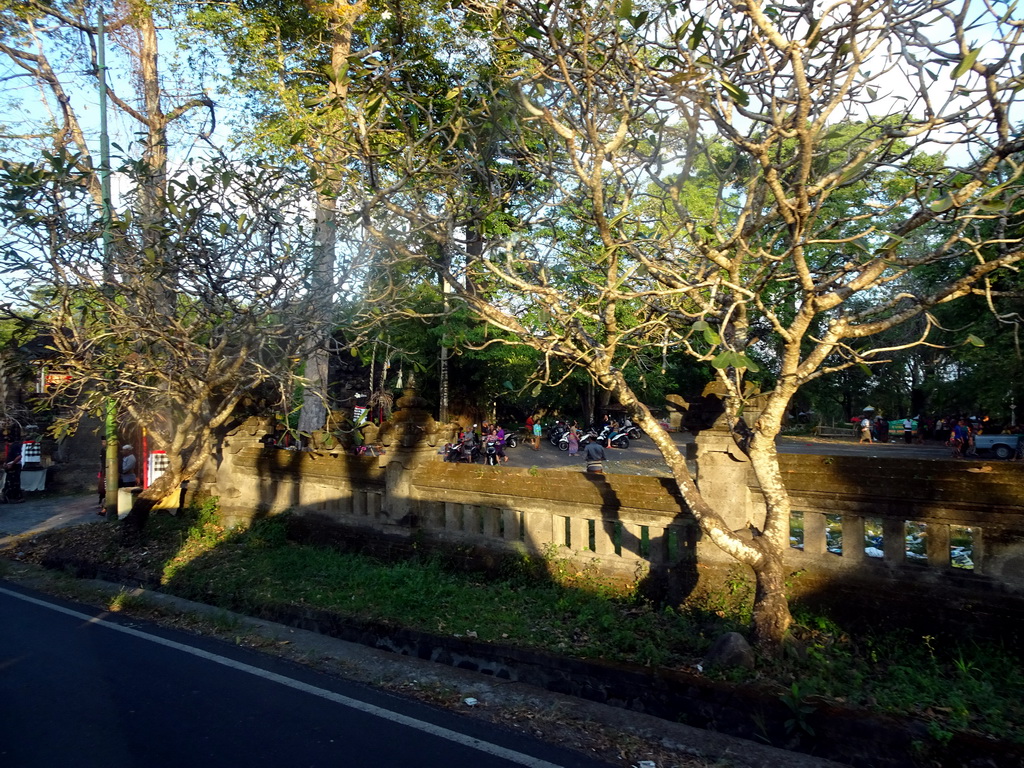 Entrance to the Setra Gede temple at the Jalan Kuruksetra street, viewed from the taxi from Uluwatu