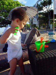 Max playing with sand at the beach of the Inaya Putri Bali hotel