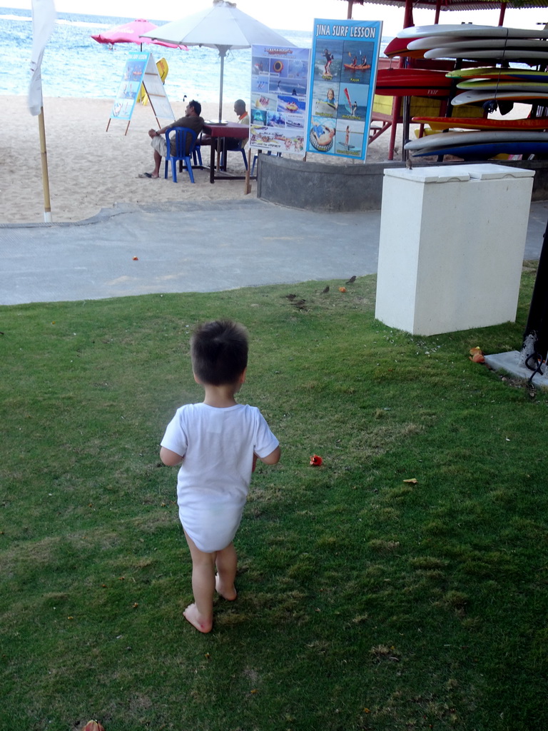 Max with birds at the beach of the Inaya Putri Bali hotel