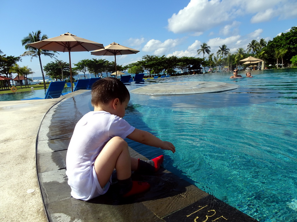 Max at the swimming pool of the Inaya Putri Bali hotel