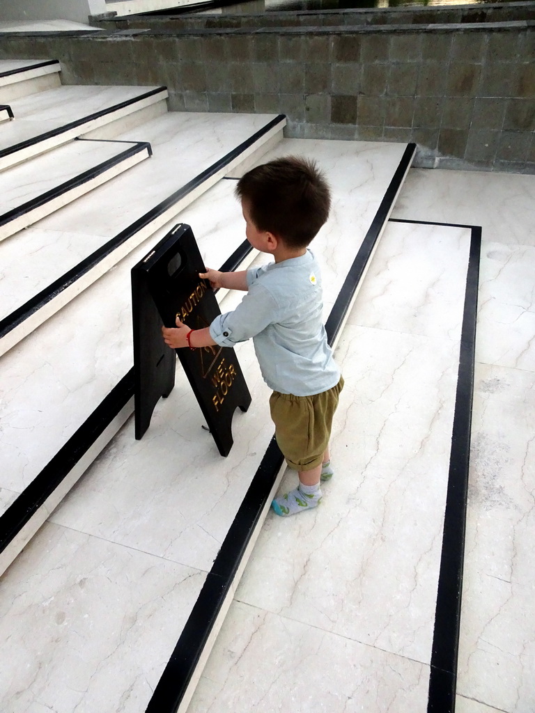 Max at a staircase at the Inaya Putri Bali hotel