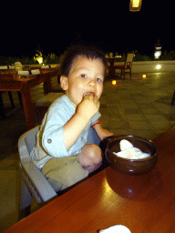 Max eating Krupuks at the Homaya Restaurant of the Inaya Putri Bali hotel