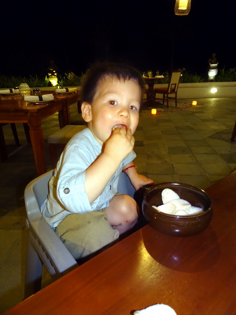 Max eating Krupuks at the Homaya Restaurant of the Inaya Putri Bali hotel