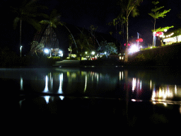 Swimming pool and lobby building of the Inaya Putri Bali hotel, by night