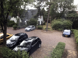 Our cars parked in front of our holiday home at the Roompot De Katjeskelder holiday park, viewed from the first floor