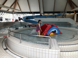 Miaomiao at the swimming pool at the Roompot De Katjeskelder holiday park