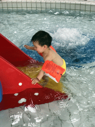 Max at the swimming pool at the Roompot De Katjeskelder holiday park