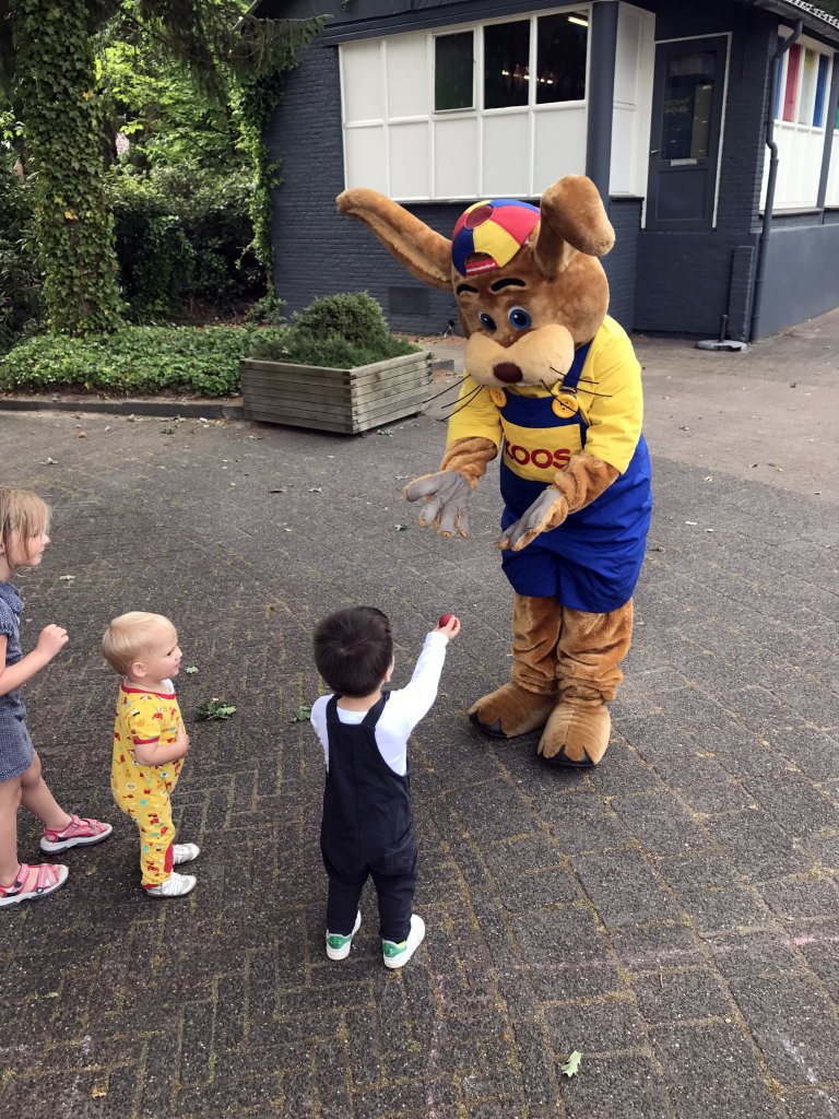 Max and the mascot Koos Konijn at the central square of the Roompot De Katjeskelder holiday park