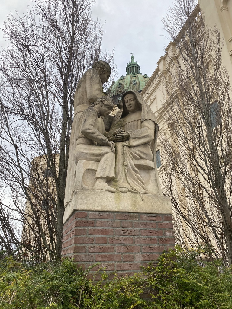 Statue at the southwest side of the Oudenbosch Basilica at the Pastoor Hellemonsstraat street