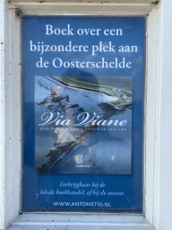 Information on the book `Via Viane` at the front of the Weegbrug Viane building at the Viane street