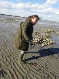 Miaomiao looking for seashells at the Viane Beach