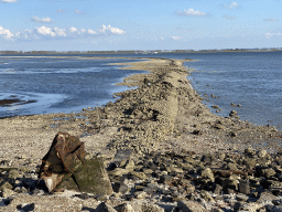 Miaomiao looking for seashells at the dyke at the Viane Beach