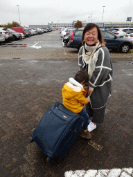 Miaomiao and Max at the parking lot of the Rotterdam The Hague Airport