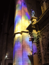 Coloured light at the left top part of the gate to the Atrium of the Vermells` Sacristy at the Palma Cathedral