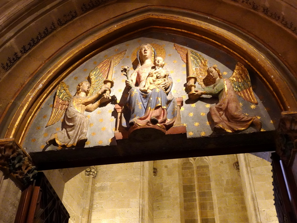 Relief above the gate from the Atrium of the Vermells` Sacristy to the Vermells` Sacristy at the Palma Cathedral