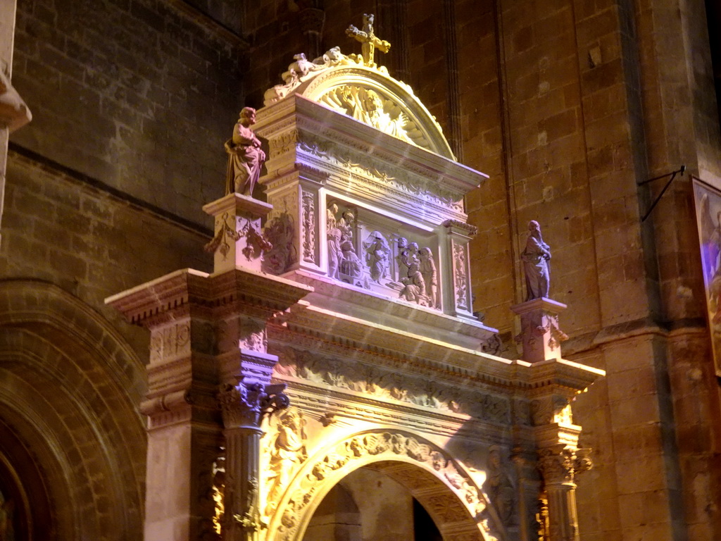 Coloured light at the top part of the gate to the Atrium of the Vermells` Sacristy at the Palma Cathedral