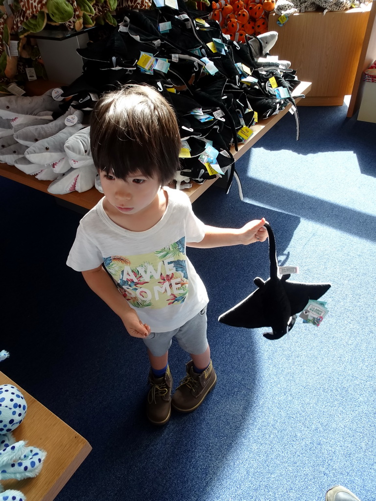 Max with a Stingray toy at the Gift Shop at the Palma Aquarium