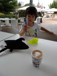 Max with Stingray and Jellyfish toys and an ice cream at the terrace of the Mediterra restaurant at the Palma Aquarium