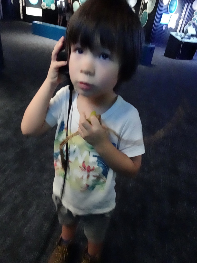 Max listening to Whale sounds at the Gentle Giants of the Sea area at the Palma Aquarium