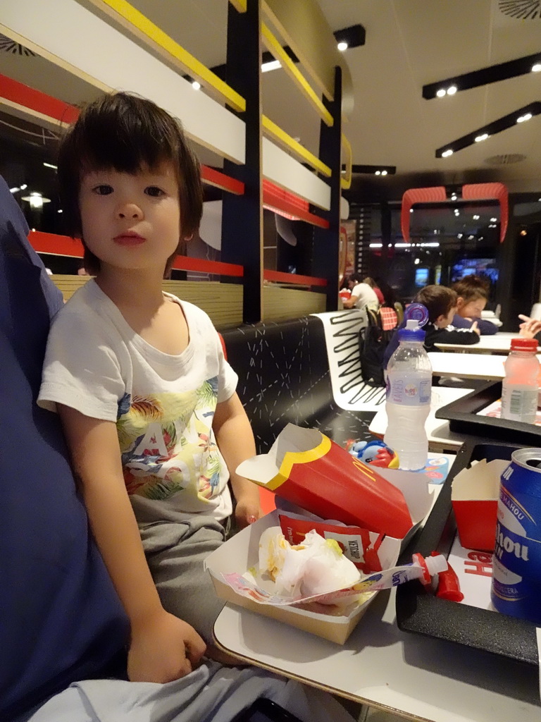 Max having dinner at the McDonald`s restaurant along the way to Cala d`Or