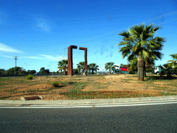 Piece of art at a roundabout to the east of the town of Llucmajor, viewed from the rental car on the Ma-19 road