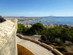 Southeast wall of the Castell de Bellver castle, the Puerto de Palma harbour and the city center with the Palma Cathedral, viewed from a window at the top floor