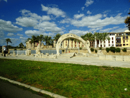 Statues at the Parc de la Mar, viewed from the rental car on the Avinguda de Gabriel Roca street