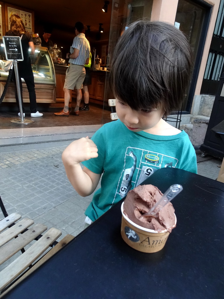 Max with an ice cream at the Amorino ice cream store at the Plaça de Weyler square